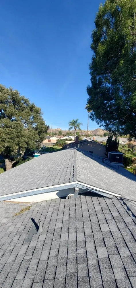 Slide of Three Clovers Roofing