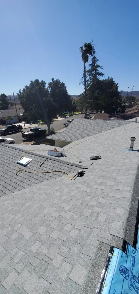 Slide of Three Clovers Roofing