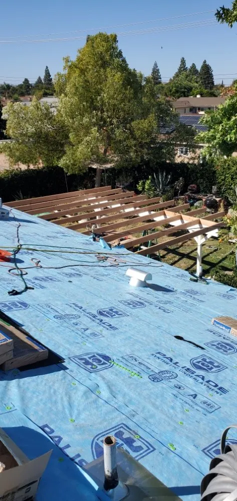 Slide of Three Clovers Roofing