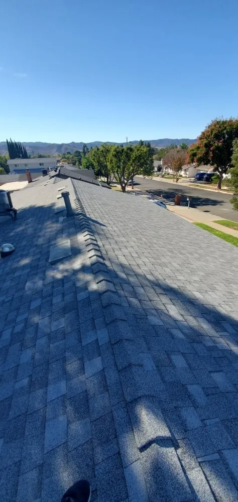 Slide of Three Clovers Roofing