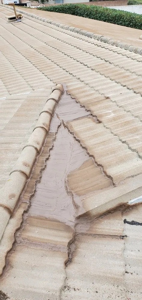 Slide of Three Clovers Roofing