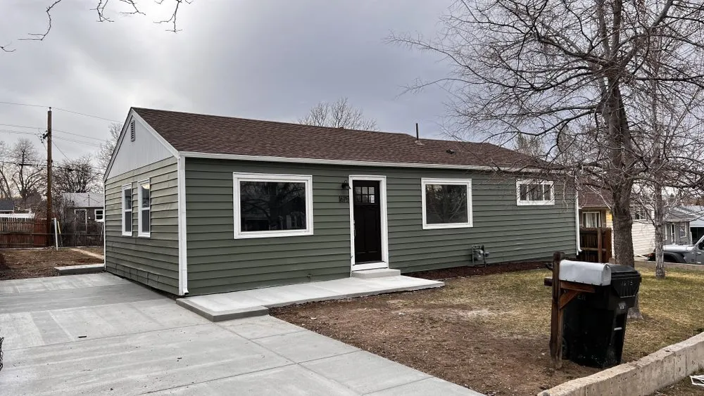 Slide of Three Pines Roofing