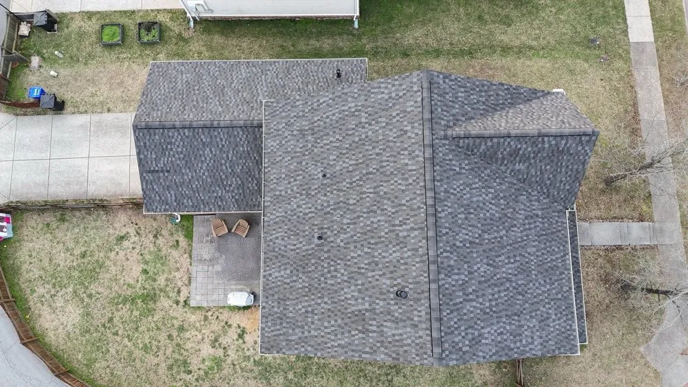 Slide of Three Stone Roofing