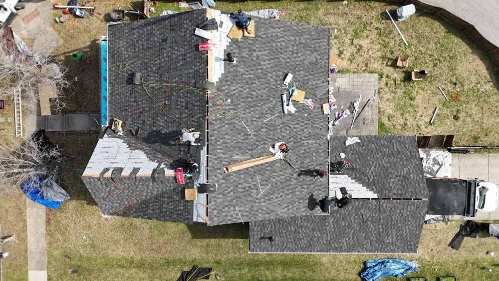 Slide of Three Stone Roofing