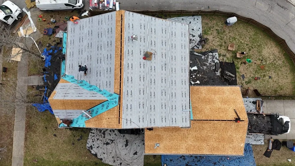 Slide of Three Stone Roofing