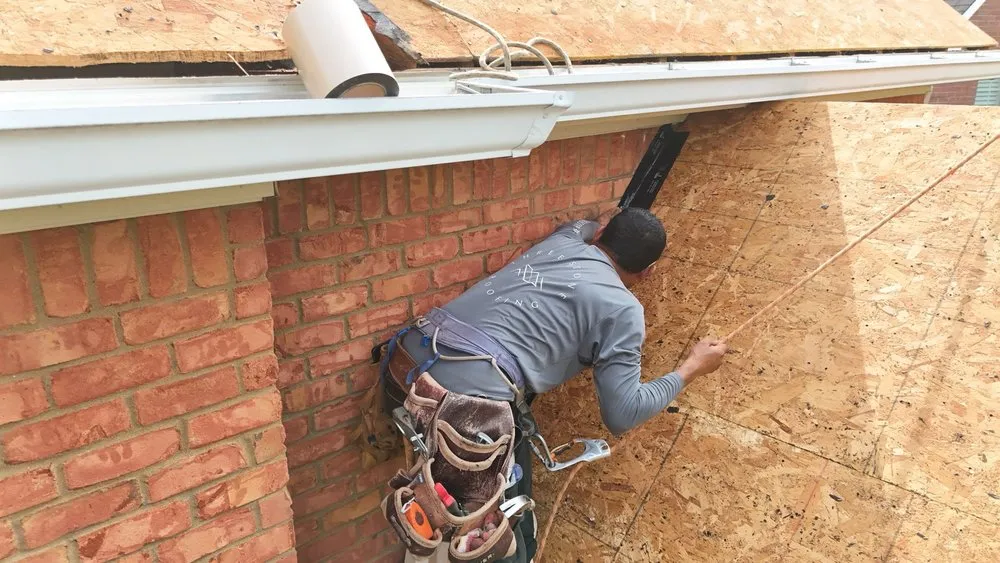 Slide of Three Stone Roofing