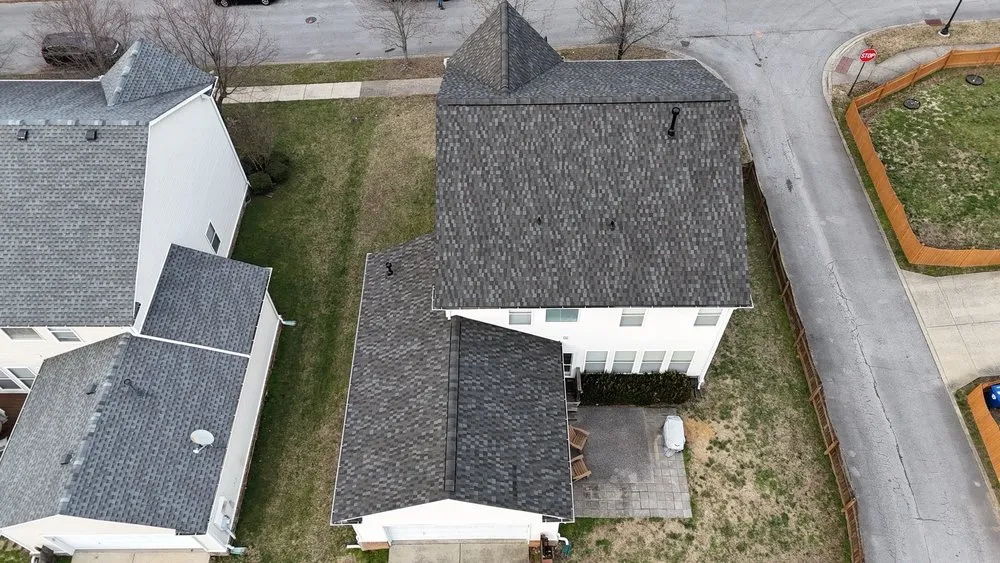 Slide of Three Stone Roofing