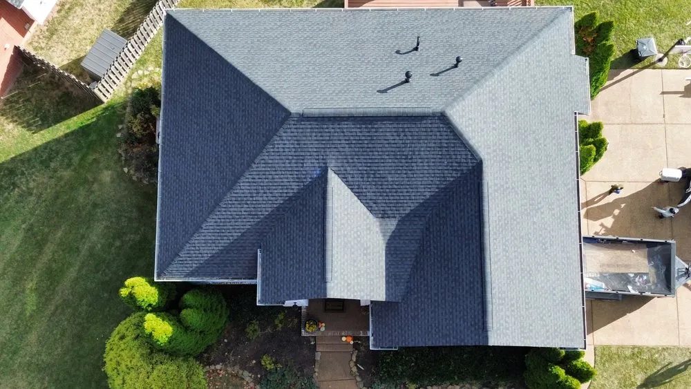 Slide of Three Stone Roofing