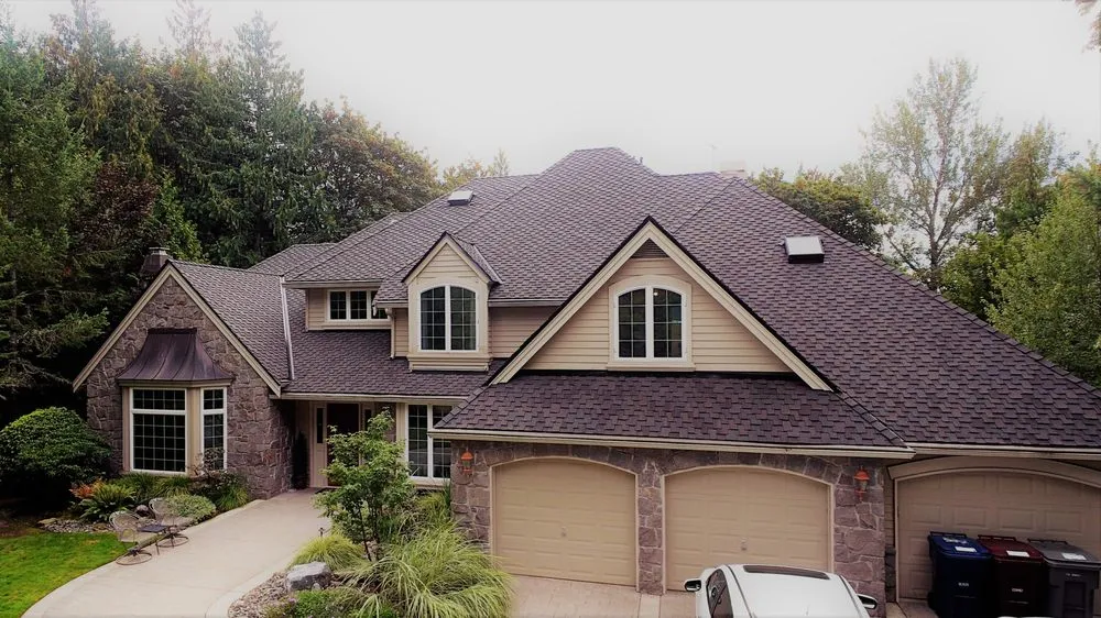 Slide of Three Tree Roofing