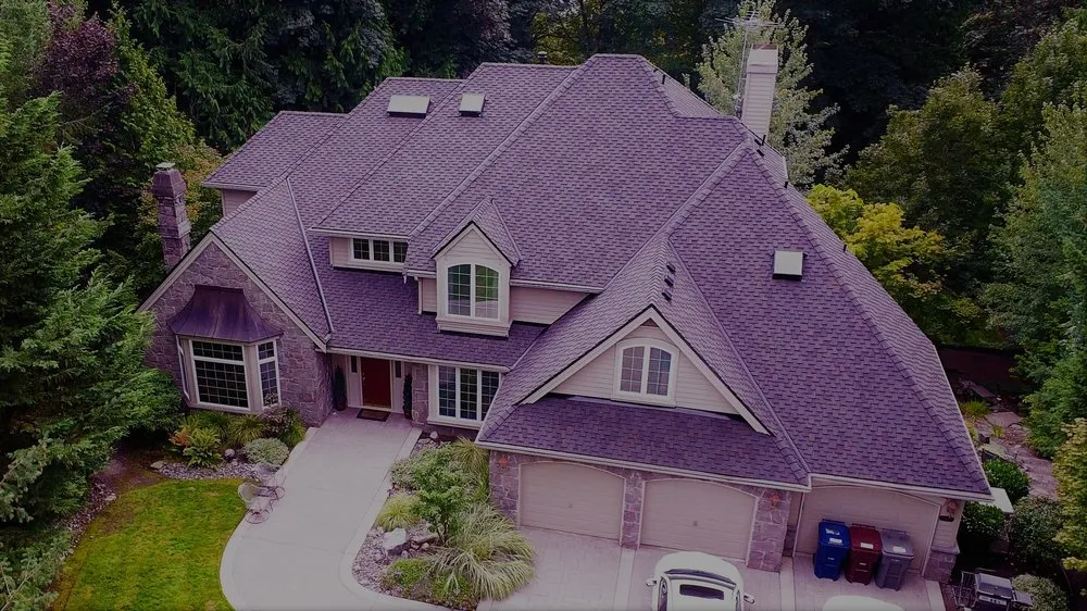 Slide of Three Tree Roofing