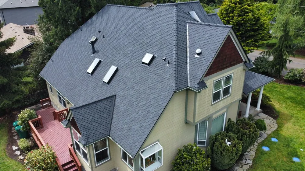 Slide of Three Tree Roofing