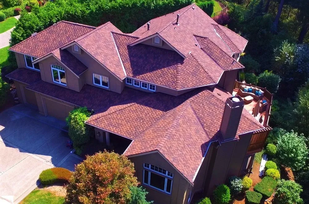 Slide of Three Tree Roofing