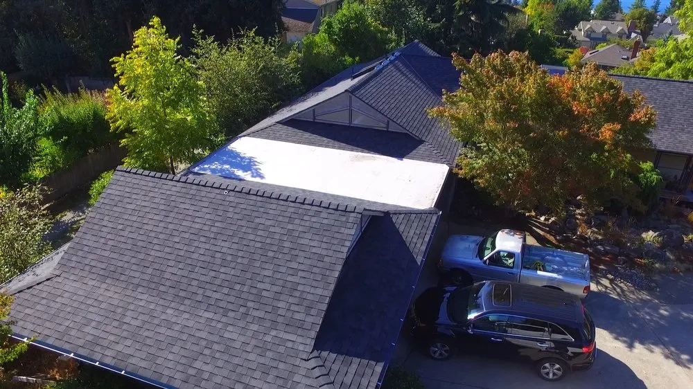 Slide of Three Tree Roofing