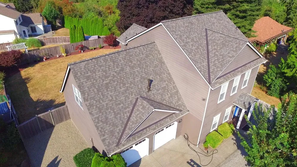 Slide of Three Tree Roofing