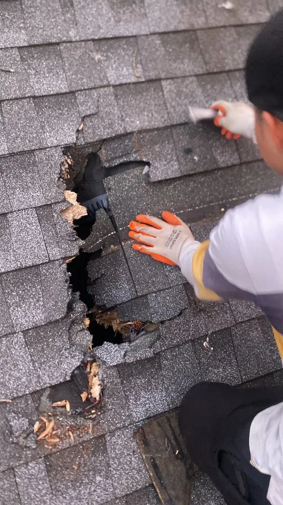 Slide of Thurtle Roofing