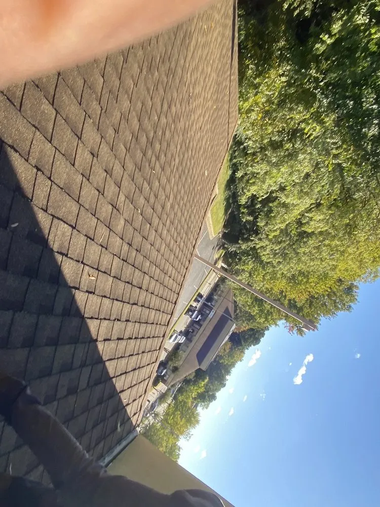 Slide of Thurtle Roofing