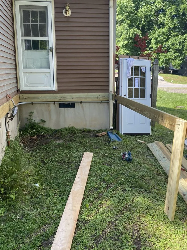 Local flat roof repair in Tracys Landing, MD by Tibbs and Sons Construction