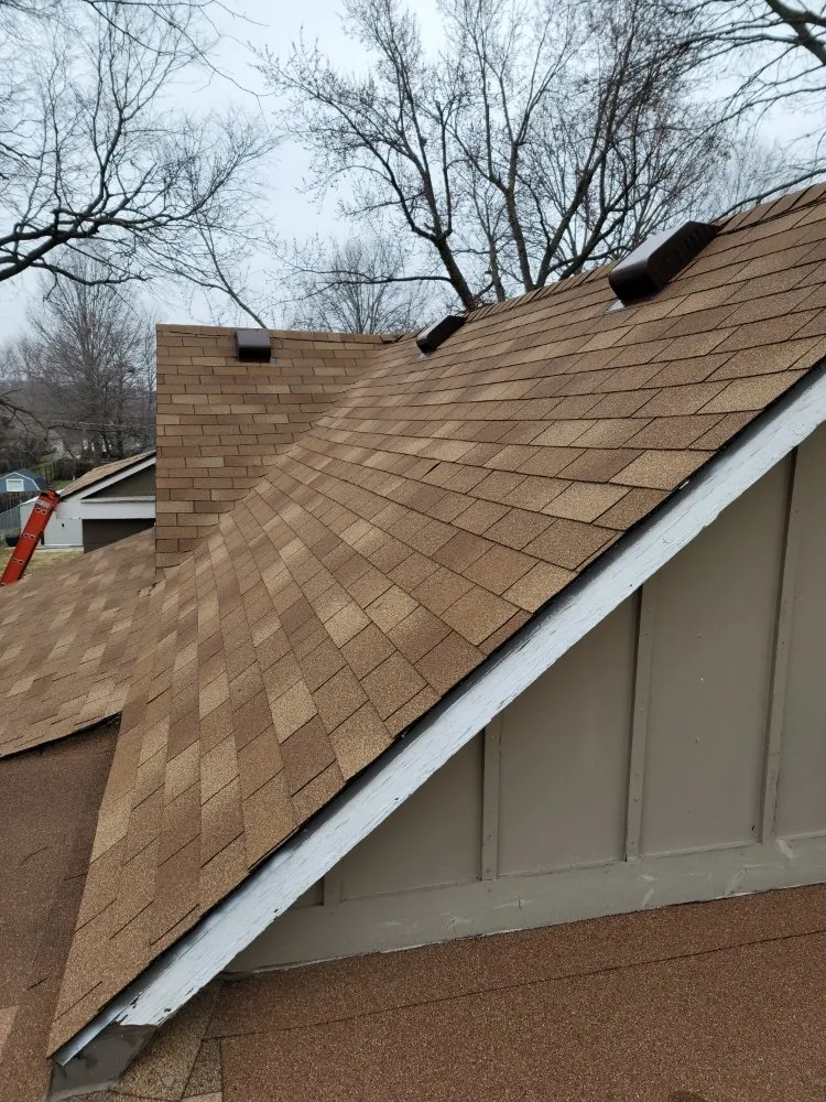 Slide of Tier One Roofing