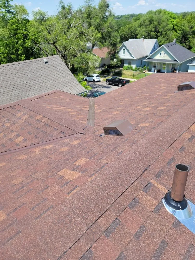 Slide of Tier One Roofing