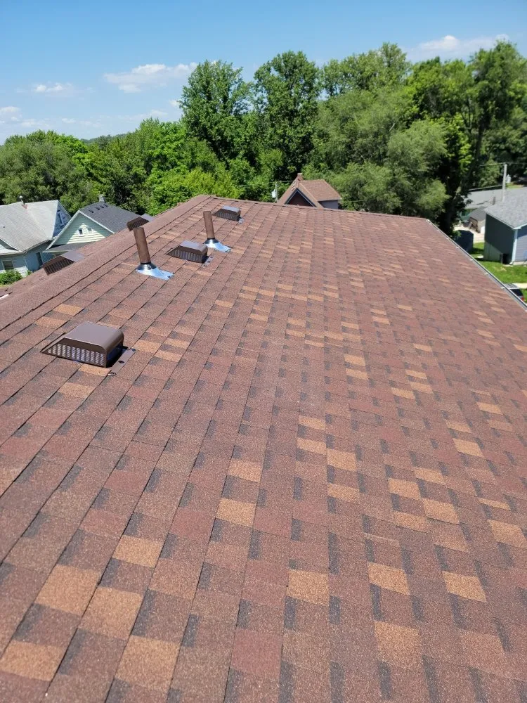 Slide of Tier One Roofing