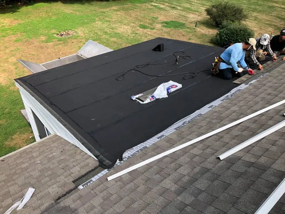 Slide of Tiger Roofing