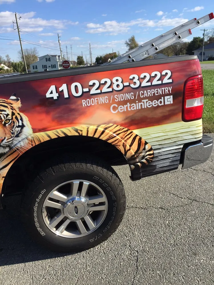 Slide of Tiger Roofing