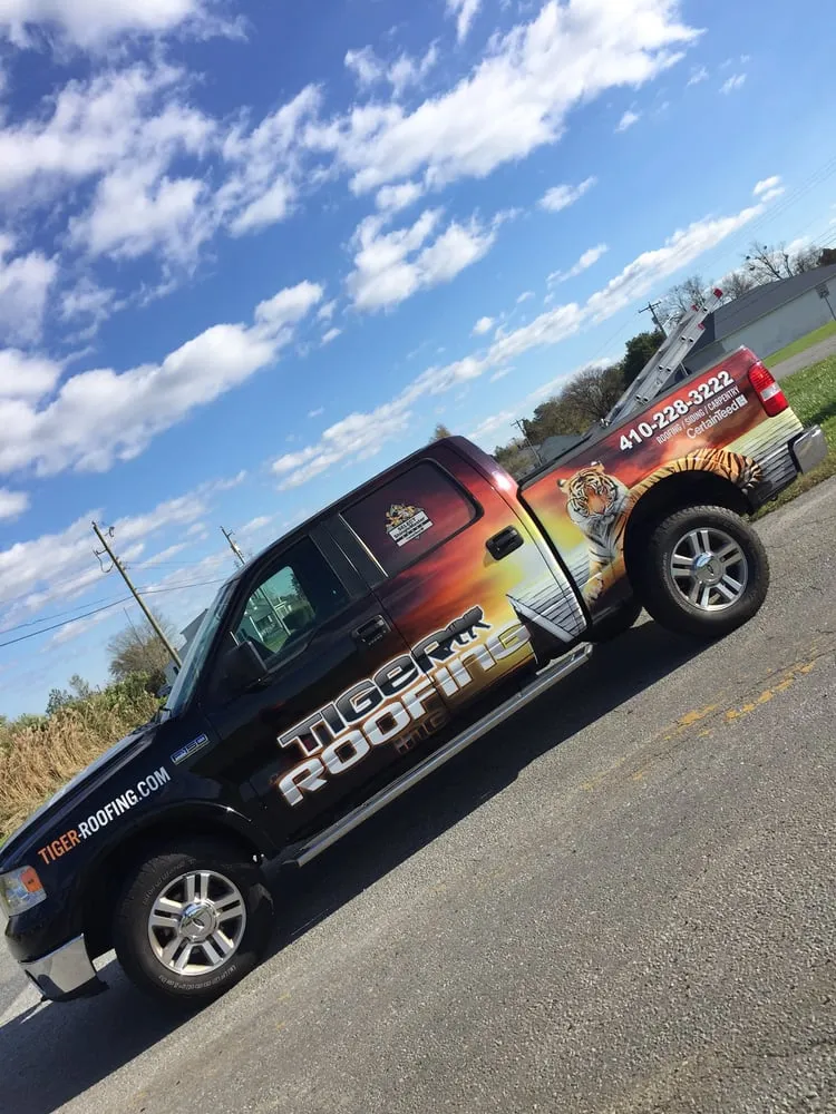 Slide of Tiger Roofing