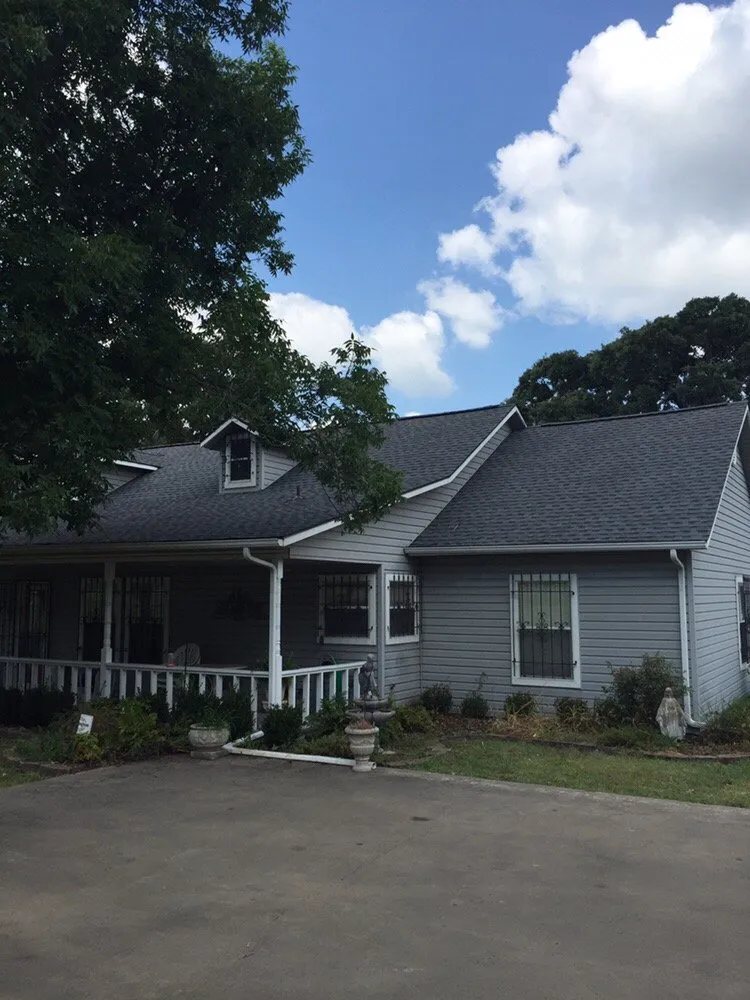 Slide of Tiger Roofing