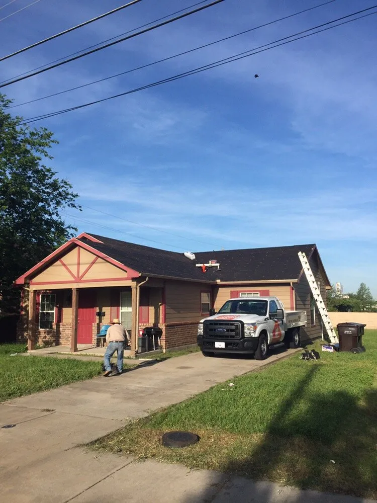 Slide of Tiger Roofing
