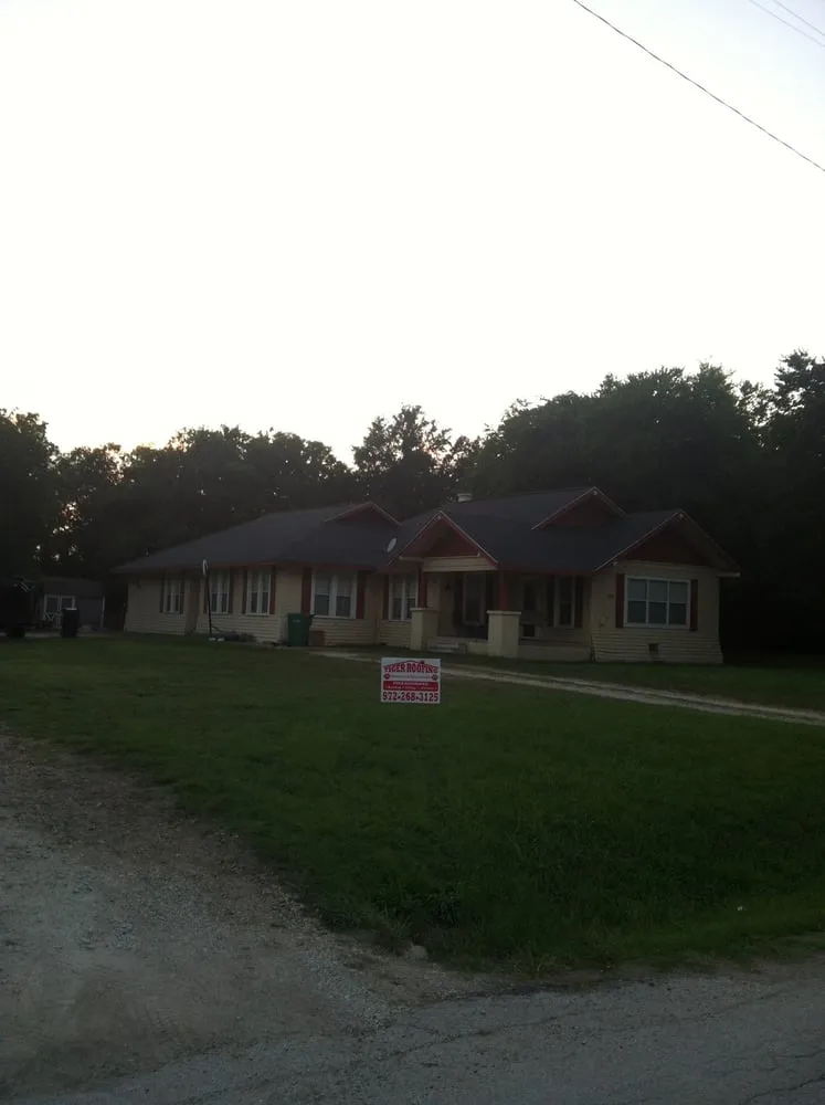Slide of Tiger Roofing