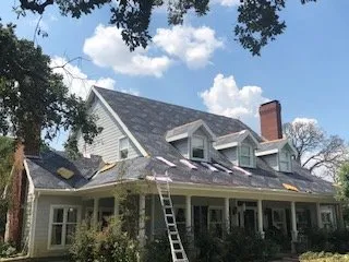 Slide of Tiger Roofing