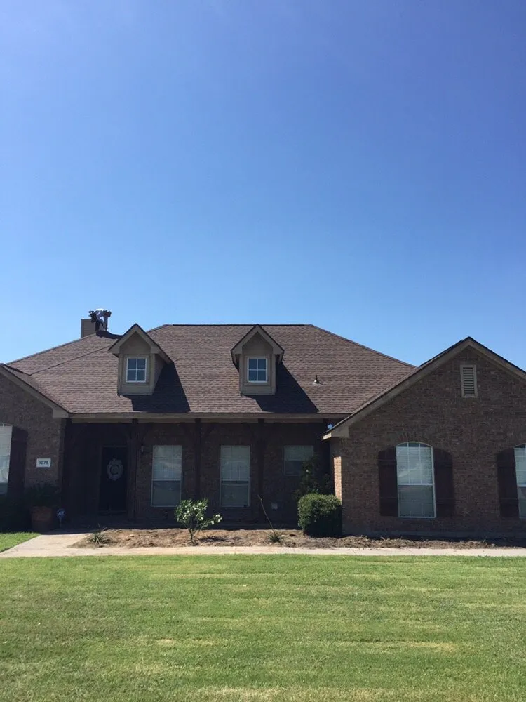 Slide of Tiger Roofing