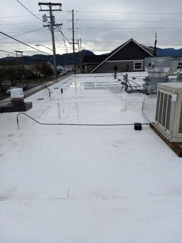 Slide of Tiger Roofing