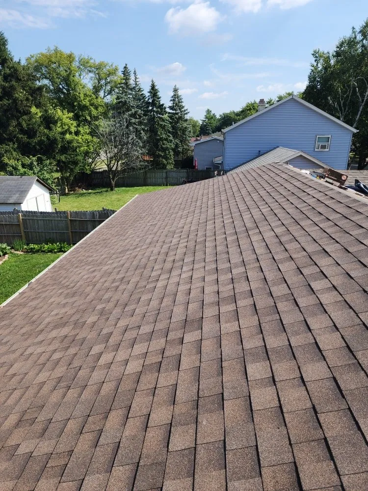 Slide of TIK Roofing