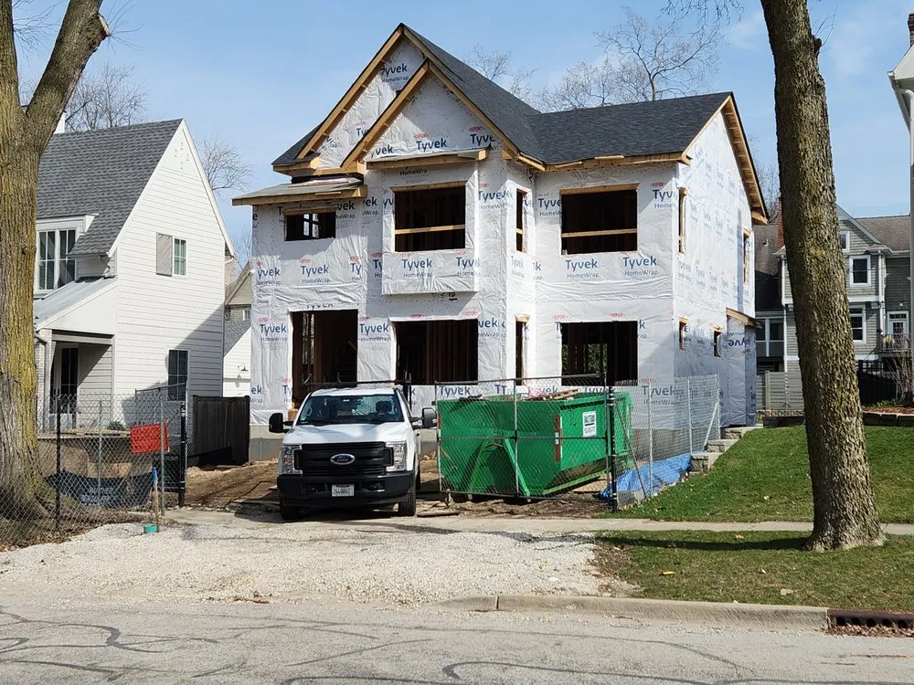 Slide of Tilden Roofing