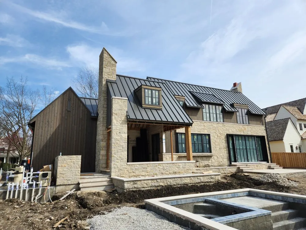 Slide of Tilden Roofing