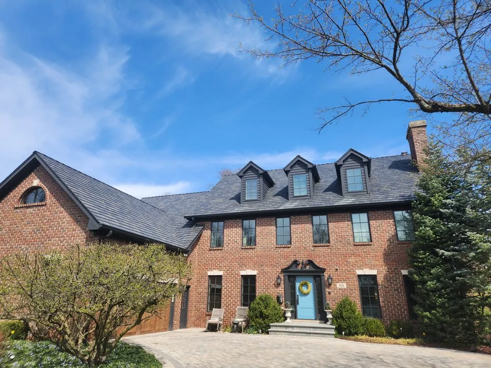 Slide of Tilden Roofing