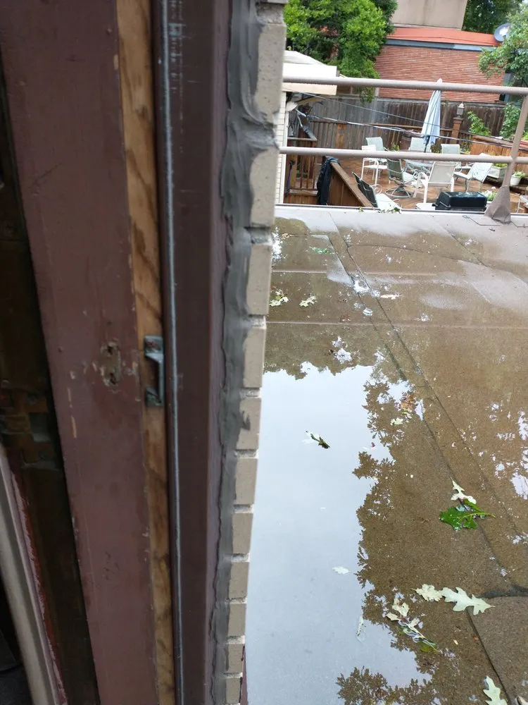 Slide of Tilden Roofing