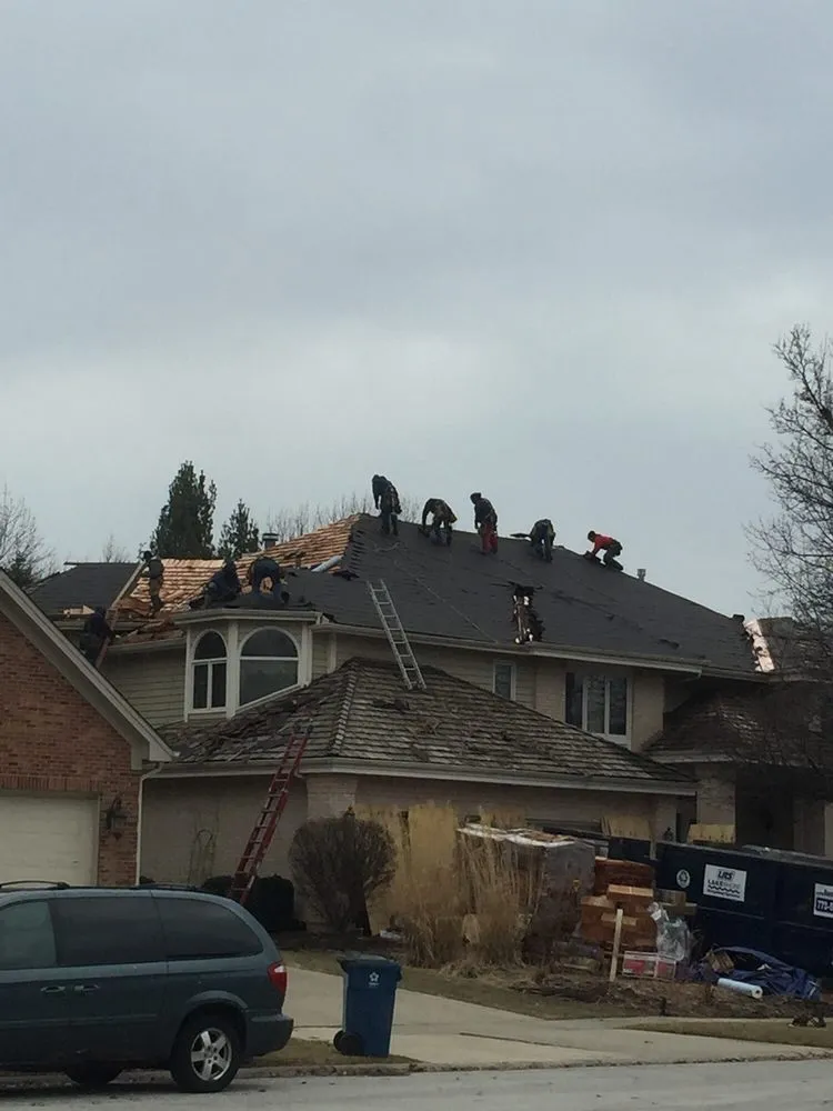 Slide of Tilden Roofing