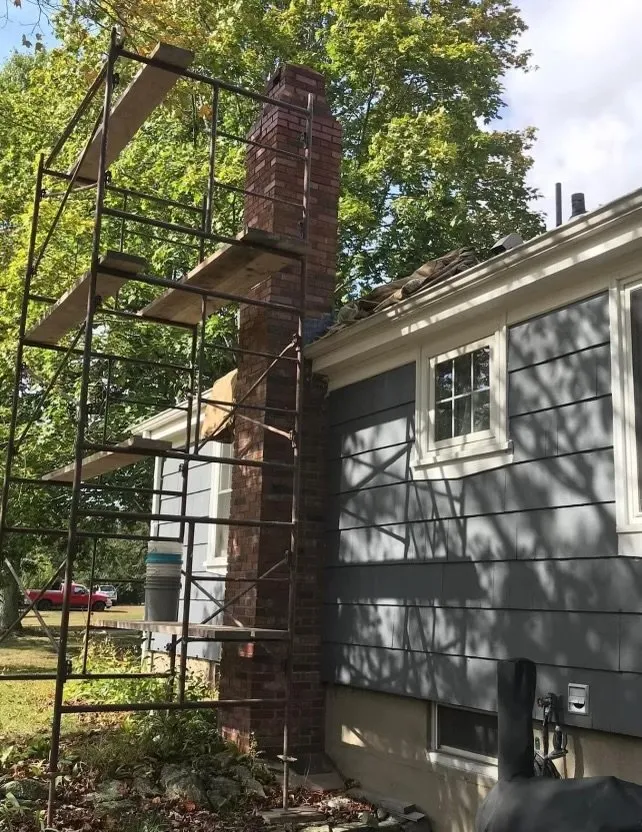 Slide of Tile Point Roofing & Construction