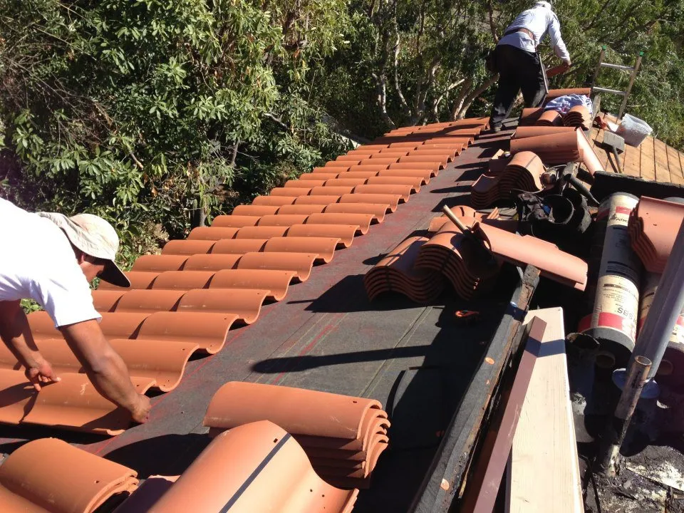 Slide of Tile Point Roofing & Construction