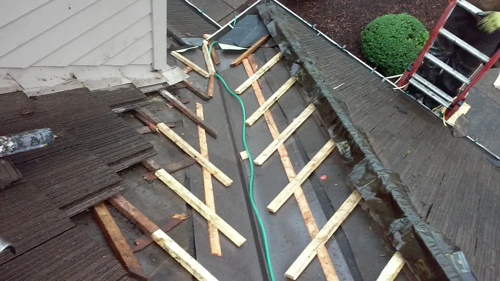 Slide of Tillys Roofing Repair