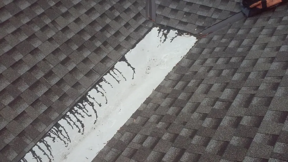 Slide of Tillys Roofing Repair