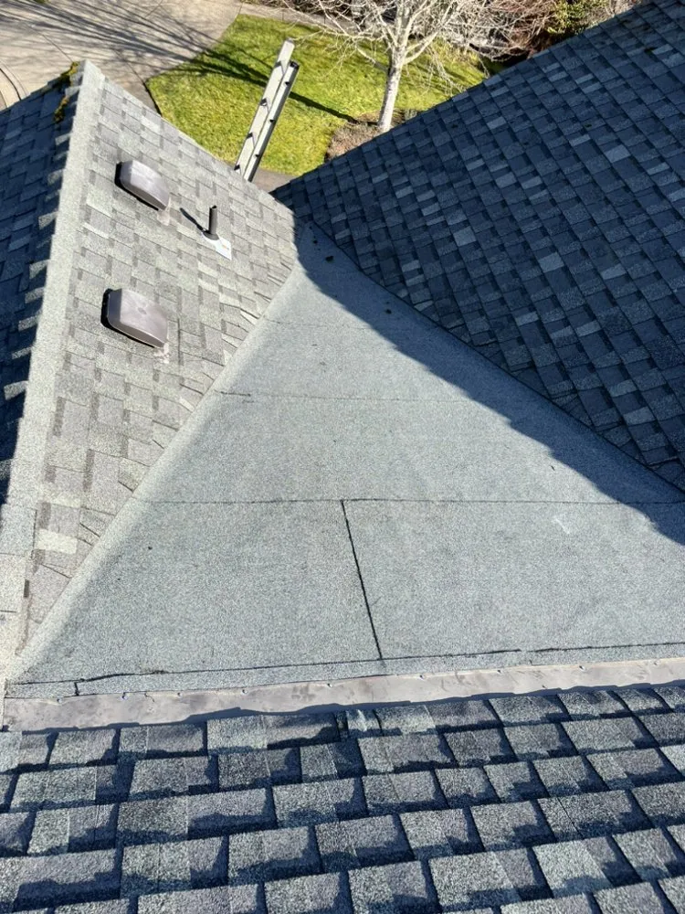 Slide of Tillys Roofing Repair