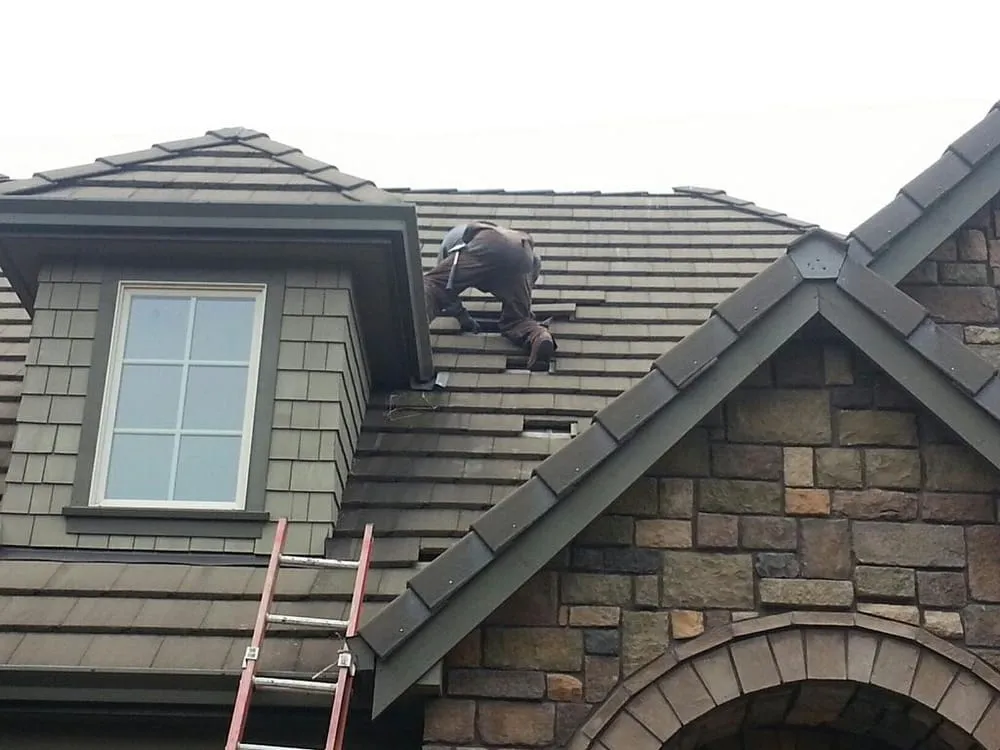 Slide of Tillys Roofing Repair