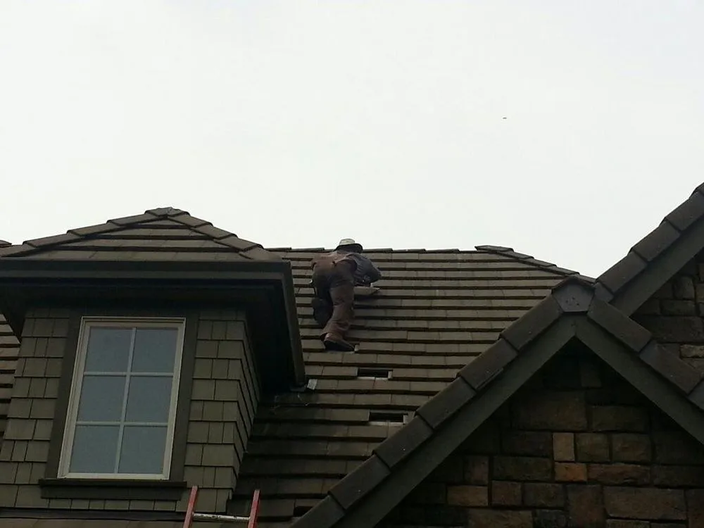 Slide of Tillys Roofing Repair