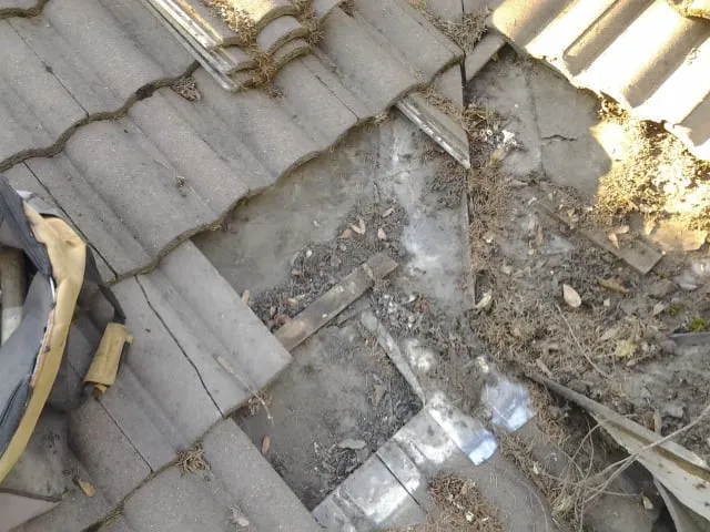 Slide of Tillys Roofing Repair