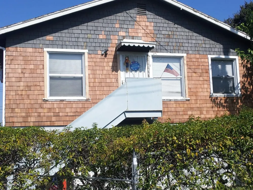 Slide of Tim Outzen Roofing