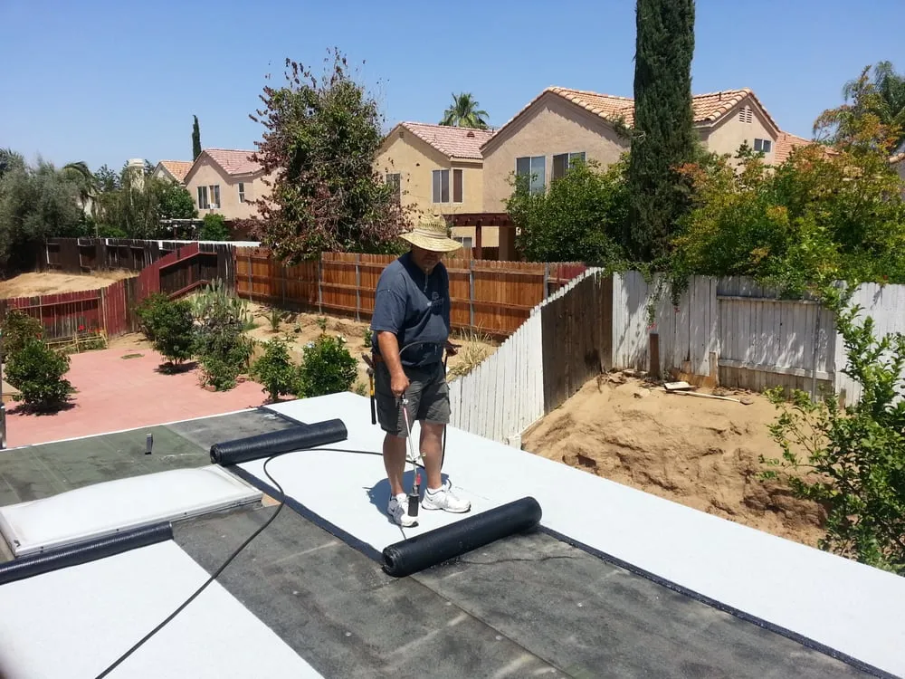 Slide of Tim Outzen Roofing