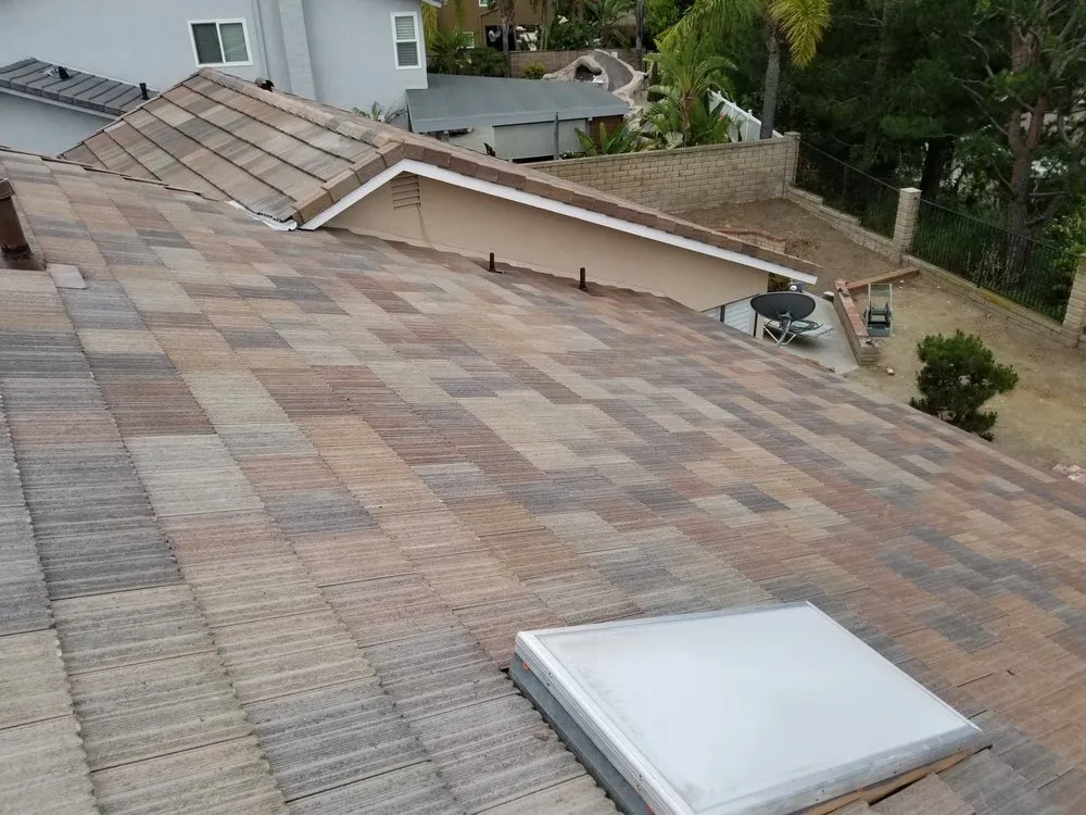 Slide of Tim Outzen Roofing